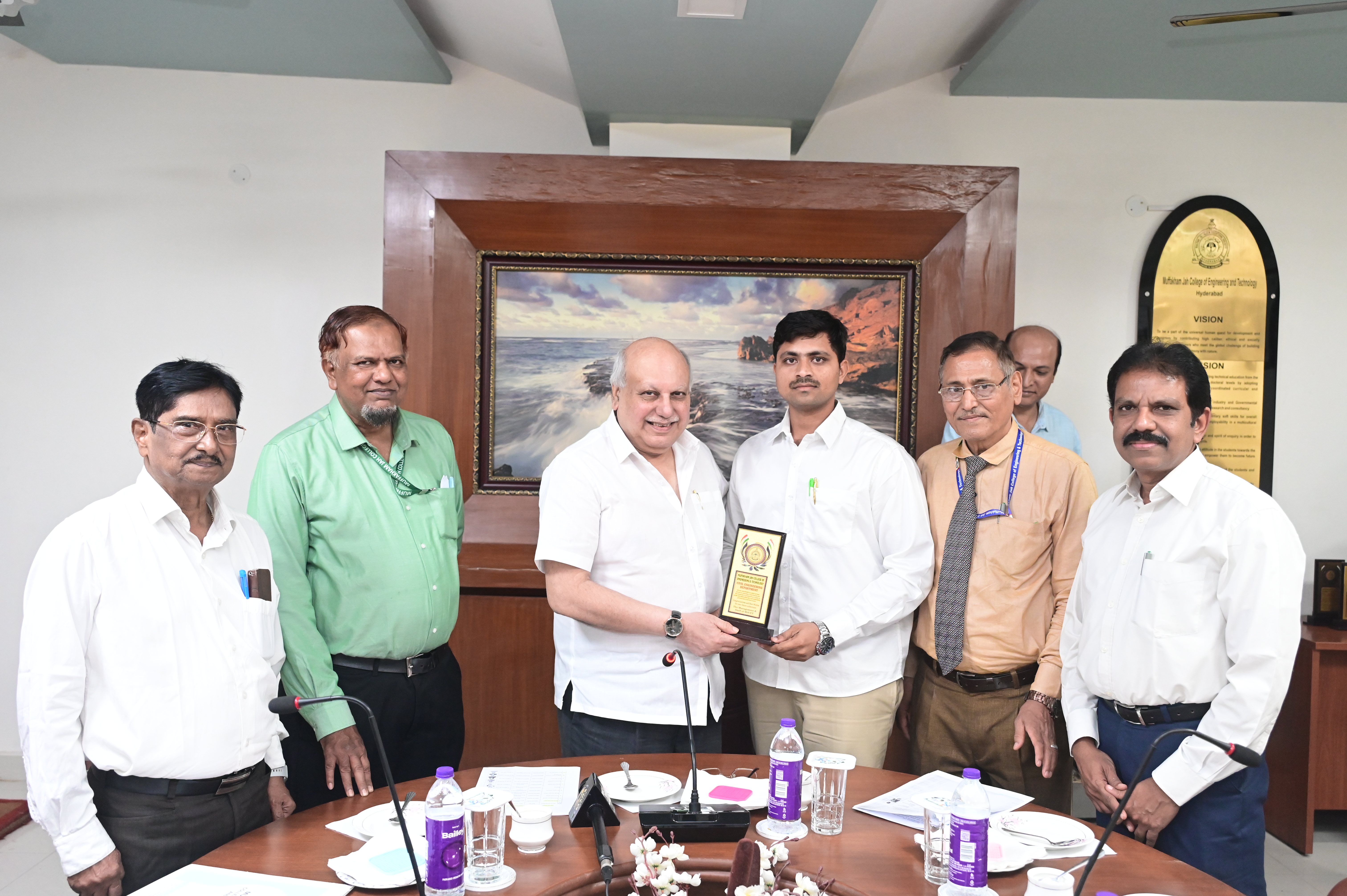 Mr. Md Saif Ali, SI receiving memento from Hon. Secretary Janab Zafar Javeed, SUES